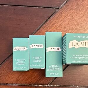 A bundle of 4 travel size La Mer Teal Skincare Collection